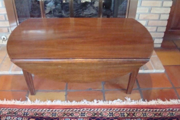 Mahogany drop leaf coffee table.
