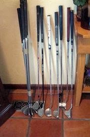 Set Taylor Made Super steel golf clubs and several putters including Odyssey, Acuity & etc. Not shown, golf bag & etc.