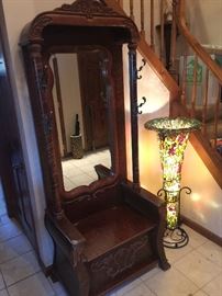 Wood Hall tree with mirror and storage seat. 821/2 inch tall x 311/4 inch wide x 20 deep