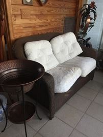 Imitation of wicker loveseat, copper server on stand