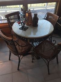 Wood, iron and marble round patio table