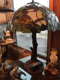 Tiffany like lamp with bird carving
