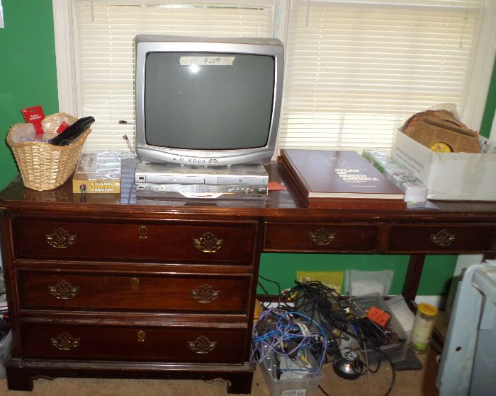 one of many desks available, DVD player & another small TV