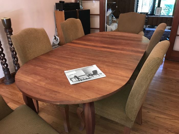 Crate and Barrel Dining Room table and 6 chairs.  Shown with 2 leaves, another leave is available.  2 captains chairs and 4 regular chairs. 