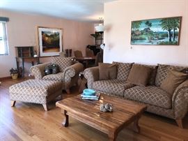 Living room set with special attention to the coffee table made with wood from the bridge at Royal Gorge in Colorado