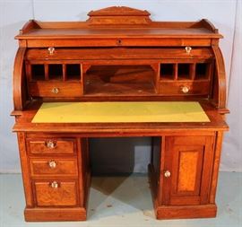 089c Walnut Victorian cylinder roll desk with burl trim, 49 in. T, 48 in. W, 23 in. D.