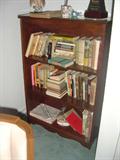 Many Signed Miss & LA Books on this bookshelf..NOT Faulkner..
However early editions of Faulkner, 2 -3 welty books One signed..