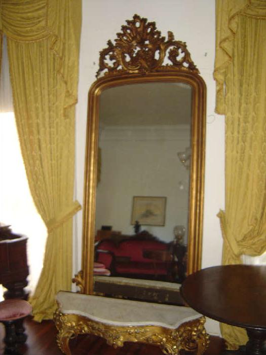 French Rococco Gilt Pier Mirror and Gilt Marbletop Base
Approx 12 feet tall