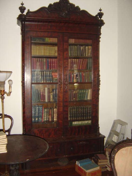 L3 - Rosewood Rococco Revival Bookcase - 9 ft  or 112 inches
        
 Main body: 53"  wide  
 
Base: 57"  wide