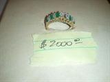 14 kt gold ring with with emeralds and diamonds. One Emerald Missing.
Ring has 5 Marquis Cut emeralds @ .10 points each 1/2 ct total weight
also Has 5 Diamonds (3 @ .15 points and 2 @ .07 points) 1/2 CT TW