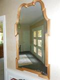 One of a Pair Chippendale Gilt wall Mirrors over Consoles