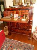 Flame Mahogany Empire Butlers Chest or Secretare a abbatant
with Curly Maple Interior.