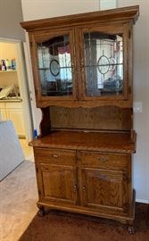 Oak/Glass Display/Curio Cabinet $165.00 Dimensions: (HxWxD in) 81x46x20in