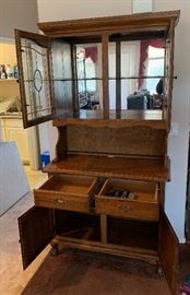 Oak/Glass Display/Curio Cabinet $165.00 Dimensions: (HxWxD in) 81x46x20in