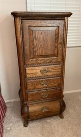 Brass Adorned Oak Slender Cabinet Dimensions: (HxWxD in) 54x24x20in