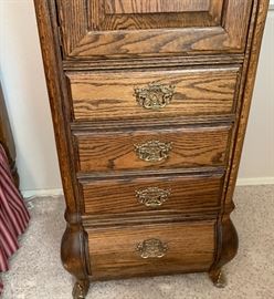 Brass Adorned Oak Slender Cabinet Dimensions: (HxWxD in) 54x24x20in