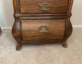 Brass Adorned Oak Slender Cabinet Dimensions: (HxWxD in) 54x24x20in