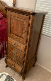 Brass Adorned Oak Slender Cabinet Dimensions: (HxWxD in) 54x24x20in