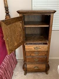 Brass Adorned Oak Slender Cabinet Dimensions: (HxWxD in) 54x24x20in