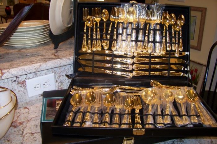 Two sets of Rogers gold plated flatware, boxed