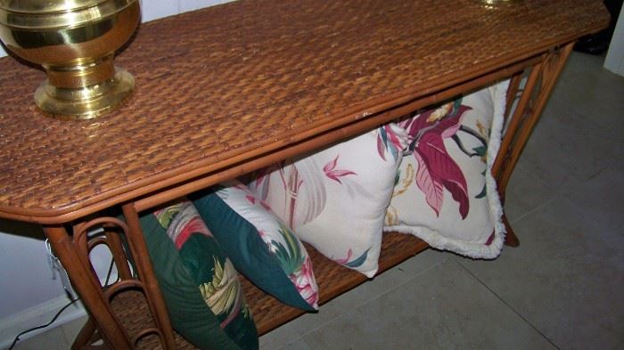Rattan console table, vintage fabric pillows