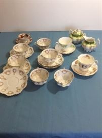 Assorted Tea Cups and Creamer Sugar Set