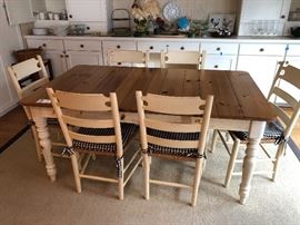 Kitchen table and six chairs.  Table has two leaves