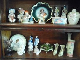 Top shelf Japan, Austria, Crescent china, Occupied Japan and unmarked. Second shelf Japan, Trico Japan and unmarked.