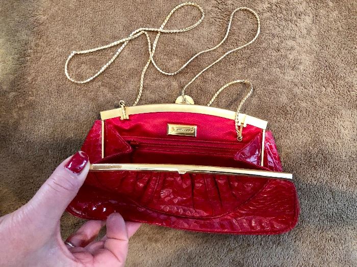 Judith Leiber red snakeskin purse