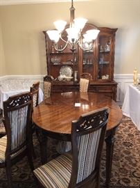 Dining set 96 inches , with 6 chairs and China Caninet $1,200. Pieces are sold separately.