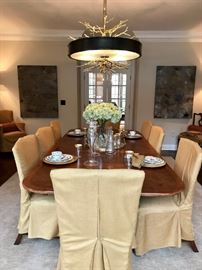 Arthur Brett Sons Dining Table and  10 Chairs  Slip Covered  as shown / See pic of Chairs without slip cover. Beautiful!  Table as Shown is 98 x 45 . Have one additional Leave that is 22". 