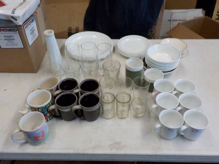 Lot of dishes . Dishes ,bowls, glasses and coffee ...