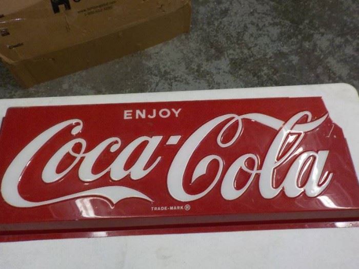 Plastic Coca Cola sign