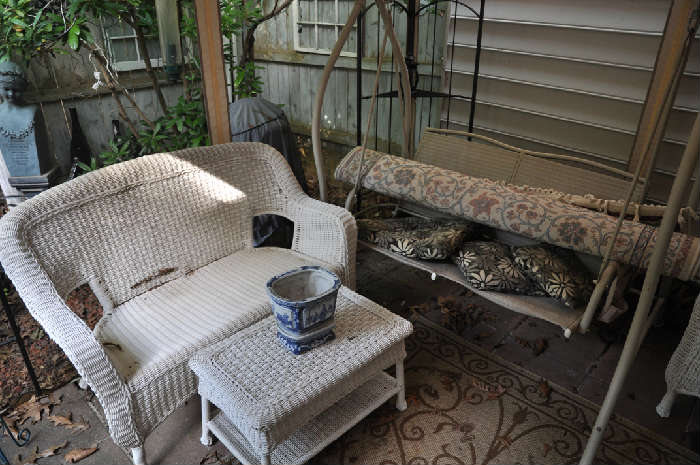 wicker settee, wicker table, two wicker chairs (shown in other photo), oriental porcelain planter, A-frame swing