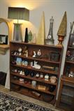 bookcase, lamp, boxes, figurines