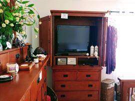 TV cabinet and chest. At the request of the seller, the cabinet  must be moved from upstairs to down stairs  by a licensed insured  mover.