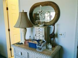 wicker dresser, lamps and mirrors