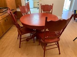 Red Stained Carved Oak Table & 4 Chairs	45in diameter x 29.5inH	