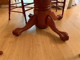 Red Stained Carved Oak Table & 4 Chairs	45in diameter x 29.5inH	