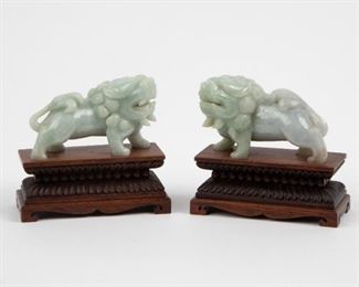 Lot 86: Chinese Carved Pale-Green Jadeite Jade Foo Dogs, 20th c.