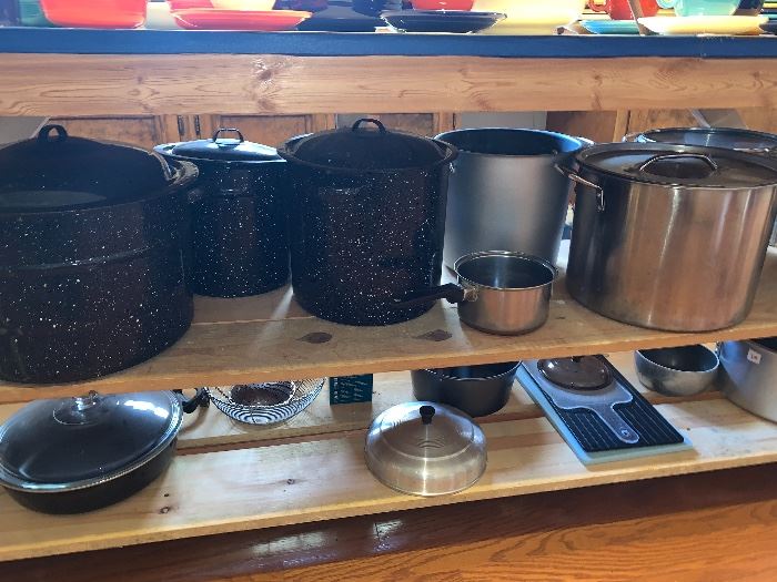 Lots of stock pots, canning jars, and small appliances.