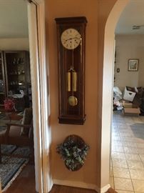 Clock, Wall hanging, grandfather style by Howard Miller