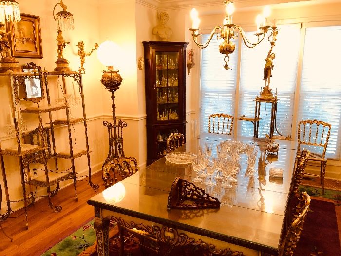 The dining room with fancy dining table also set of 6 brass chairs