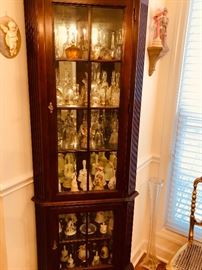 the other corner cabinet with bell collections