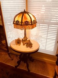 Antique slag glass & brass lamp on Victorian walnut marble top table