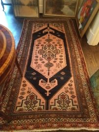 Vintage hand woven Persian Bijar rug, measures 8' x 4'.