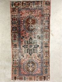 Beat up ol' Persian Heriz rug, measures 4' 5" x 2' 2".