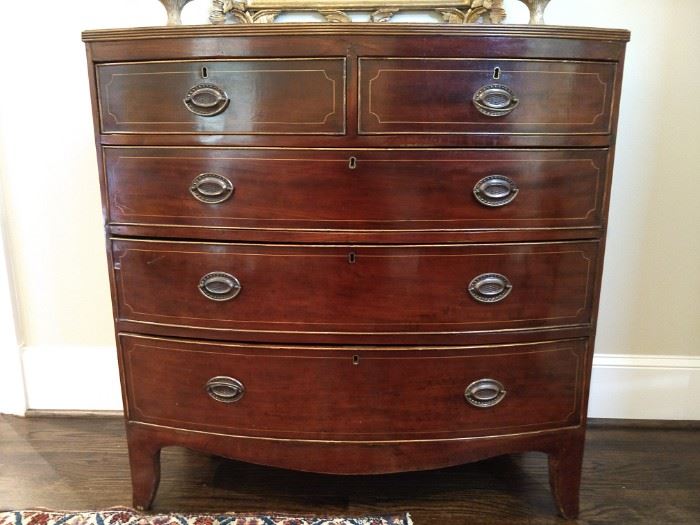 Close-up of the antique mahogany English chest.
