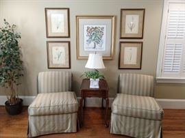 Wonderful pair of silk upholstered slipper chairs, with down cushions, by Cameron Collection, Dallas. One the wall, four of seven nicely framed 19" x 23" botanical prints, by The New York Botanical Garden.