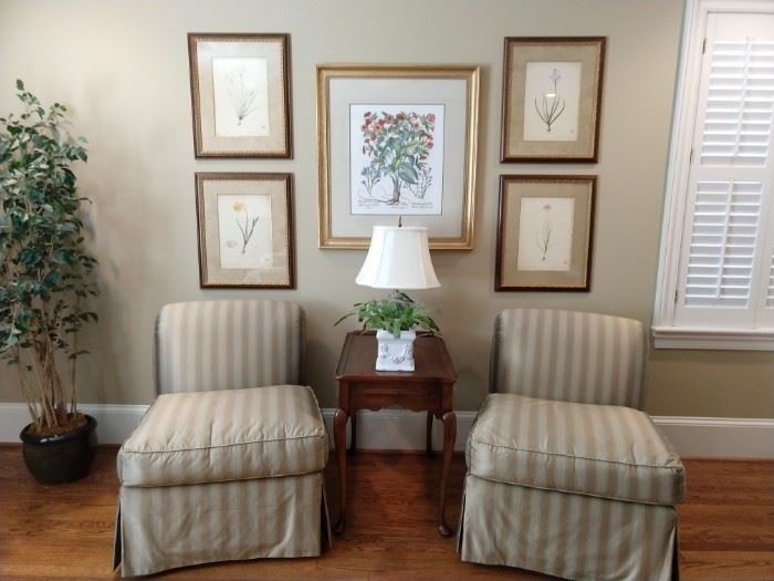 Wonderful pair of silk upholstered slipper chairs, with down cushions, by Cameron Collection, Dallas. One the wall, four of seven nicely framed 19" x 23" botanical prints, by The New York Botanical Garden.